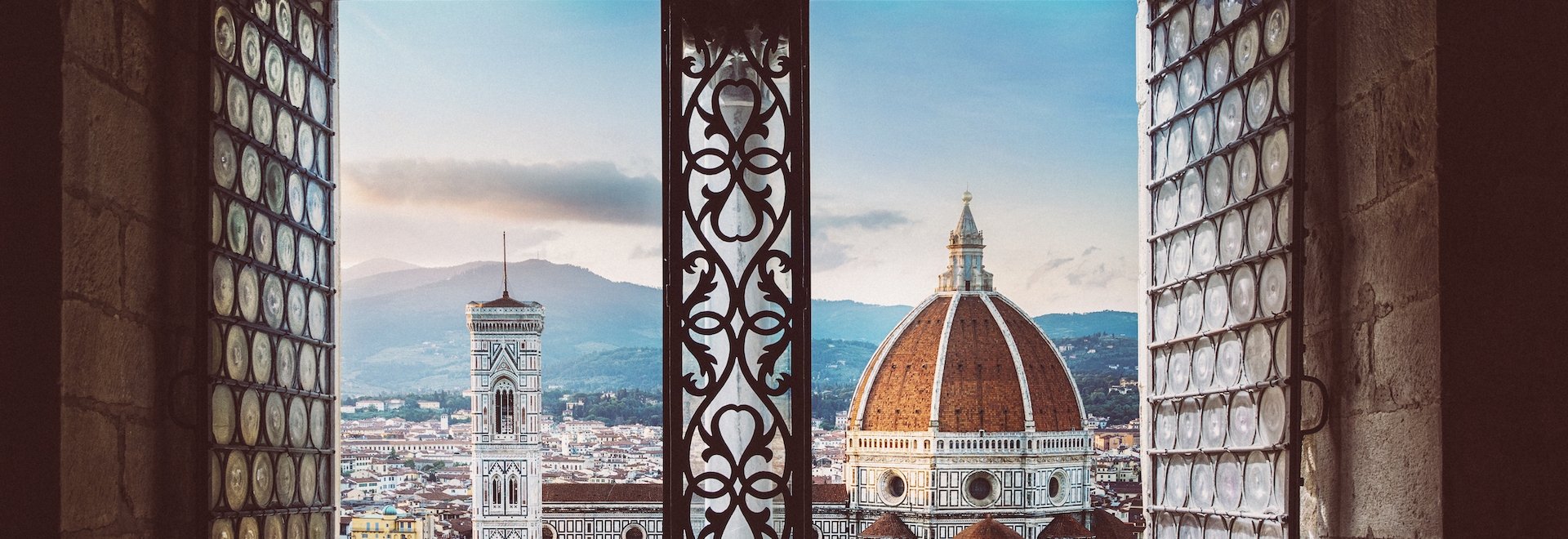 View from the old window on Florence Duomo Basilica di Santa Maria del Fiore. Florence, Italy. Collage of the historical theme and the theme of travel.